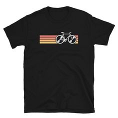 a t - shirt with a bicycle on the front and rainbow stripes in the back