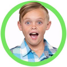 a young boy making a funny face in a green circle