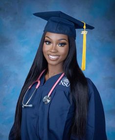 a woman wearing a graduation cap and gown