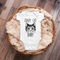 Hi there! Welcome to my new shop. I hand make things in my small studio at home. I only use great quality soft inks that are permanent and will not wash out. I also use soft shirts that are nice and comfy. Thank you for supporting handmade on etsy! Some designs are available in Baby Bodysuit, Baby Soft Shirt, Toddler Soft Shirt, Youth Soft Shirt.  Solid colors are 100% cotton. Heather colors are 90% cotton/10% polyester  Gerber Baby ONESIES® Brand - The ONESIES® Brand trademark is owned by Gerbe Cute Graphic Print Onesie As A Gift, Cute Graphic Print Onesie As Gift, Cat Baby Announcement, Cute Onesie With Funny Text As A Gift, Cat Pregnancy Announcement, Cute Onesie With Graphic Print, Birth Announcement With Cat, Pregnant Cat Maternity Shoot, Sibling Baby Announcements