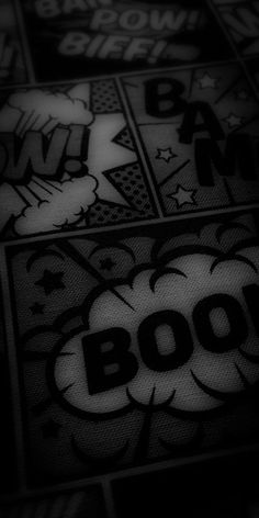 black and white photo of comic book pages with the word boo written in bold letters