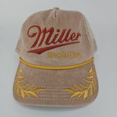 Introducing The Miller High Life Beer Rope Trucker Snapback Hat Cap Vintage 80's New. This Stylish And Adjustable Hat Is Perfect For Casual Occasions, Featuring A Solid Brown Color With The Miller High Life Brand And 80s Beer Theme. Made From Lightweight And Breathable Cotton Corduroy And Mesh Back Fabric, This Hat Is Suitable For All Seasons. It Also Includes Features Such As An Adjustable Strap, Making It Easy To Personalize The Fit. This Hat Is A Unit Type With A Quantity Of 1, Perfect For Me Retro Hat, Miller High Life, Beer Theme, Trendy Hat, High Life, Adjustable Hat, Snapback Hats, Brown Color, Accessories Hats