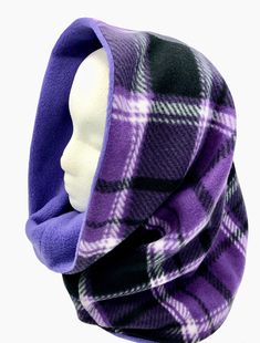 "Stay warm this Fall and Winter in a practical neck and headwear clothing accessory. This two layer super warm reversible hooded scarf will stay on to provide comfort and warmth against cold winter chills. Striking Purple, Black and White tartan pattern is paired with solid Lavender plush fleece on the reverse side to give you options for styling your look. You want the tartan or plain look? This scarf is reversible so you decide! For added styling options wear as a hood scarf with the top folde Cheap Hooded Tops For Outdoor Activities, Free Pattern For Hood With Scarf, Fleece Scarf Sew, Free Hooded Scarf Pattern, Triangle Scarf Sewing Pattern, Winter Camping Outfits, Reversible Plush, Hood Scarf, Hoodie Scarf