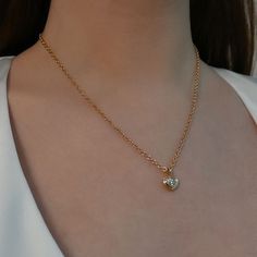 This Double Bubble Necklace features a 0.50ct heart shape diamond. Its unique bezel setting adds an elegant and charming touch, making it a truly exquisite piece of jewelry. Available in 18K Yellow Gold Diamond heart weight = 0.50 carats GIA Certified Chain length = 18in For custom orders please email info@stephaniegottlieb.com This item is FINAL SALE Elegant Heart Cut Necklace With Single Diamond, Gold Heart Pendant With Bezel Setting, Gold Heart Pendant Jewelry With Bezel Setting, Gold Heart Jewelry With Bezel Setting, Heart Pendant Necklace With Bezel Setting, Gold Necklaces With Single Diamond Heart Cut, Gold Heart Cut Single Diamond Necklace, Gold Necklace With Heart Cut Single Diamond, Heart Cut Gold Necklace With Single Diamond