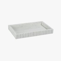 an empty white tray on a white background