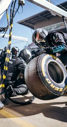 a group of motorcycle riders sitting next to each other