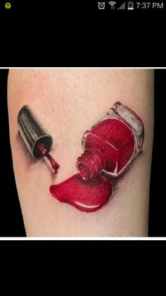 a tattoo with a red liquid pouring out of it