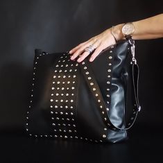 Large leather crossbody bag with studded flap and adjustable strap for chic women. Large messenger bag with studs practical and comfortable with a lot of capacity because it has a wide bottom, has an inside pocket and a strap with a small carabiner for keys or a small purse, the bag closes with magnet. It has an adjustable strap with studs on both sides, you can use it for other bags because you will fall in love with it. This great bag can be carried over the shoulder or as a shoulder bag. The strap which is also made with studs is adjustable on both sides, it covers different styles, urban, casual, gothic, punk, you can wear it with jeans and sneakers or with a suit jacket and heels is a very versatile collection.  I work all the models little by little and in order of order, with profes Large Leather Crossbody Bag, Messenger Bag Leather, Crossover Bag, Crossover Bags, Black Cow, Gift For Best Friend, Gothic Punk, Black Leather Bags, Small Purse