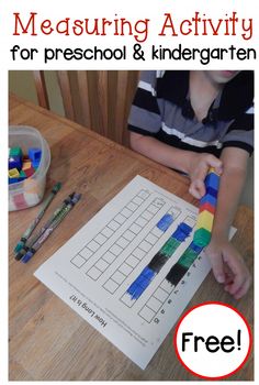 a young boy is working on a crossword activity for preschool and kindergarten