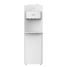 a tall white refrigerator freezer sitting on top of a floor next to a wall