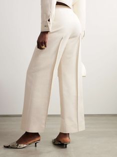 Luxury White Straight Leg Bottoms, Luxury Cotton Bottoms For Workwear, Luxury Cotton Workwear Bottoms, Luxury Cotton Bottoms For Work, Luxury White Workwear Pants, Cream Straight Pants With Belt Loops, Luxury Wide Leg Bottoms With Pressed Crease, Luxury White Pants For Workwear, Elegant Cream Straight Leg Bottoms