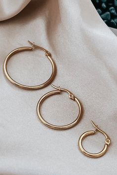 Description Perfect everyday accessory - 18k gold plated hoops, perfect for dressing up or down. Materials & Care Tarnish and water resistant. 18k Gold plated stainless steel. Hypoallergenic Wipe as needed, avoid harsh chemicals. Store jewelry in a small plastic zip lock. Measurements Small 1/2" Medium 1" Large 1 1/4" Rose Gold Plated Hoop Earrings Tarnish Resistant, Everyday Tarnish Resistant Rose Gold Hoop Earrings, Everyday Rose Gold Tarnish Resistant Hoop Earrings, Everyday Tarnish-resistant Rose Gold Hoop Earrings, Everyday Yellow Gold Stainless Steel Earrings, Trendy Tarnish Resistant 14k Gold Filled Hoop Earrings, Everyday Gold Hoop Earrings Hypoallergenic, Everyday Gold Hypoallergenic Hoop Earrings, Hypoallergenic Gold Stainless Steel Hoop Earrings