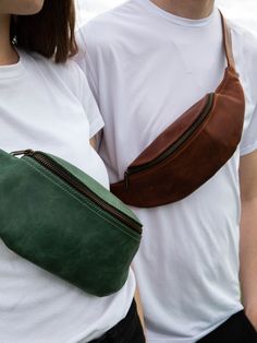 Hey there! Need a stylish and practical bag for your daily adventures? Look no further than our Classic Leather Fanny Pack. Made from high-quality leather, this hip bag is perfect for keeping your essentials close and you're hands-free.  Whether you're going for a stroll, heading to a festival, or traveling, our trendy waist bag is a must-have. With its crossbody design, it offers both convenience and style. Upgrade your accessory game with our versatile and custom leather fanny pack. Get yours today and never worry about carrying a bulky bag again! ⭐ genuine leather; ⭐ 100 % handmade; ⭐ Size: 13*4.7*2.8 inch (33*12*7 cm); ⭐ Inside one main pocket and a pocket for keys; ⭐ On the back outer wall there is a pocket with a zip You can choose the color of the leather! Please contact us if you h Thigh Bag, Banana Bag, Leather Hip Bag, Fanny Bag, Practical Bag, Leather Sling Bag, Bag Belt, Leather Fanny Pack, Leather Belt Bag