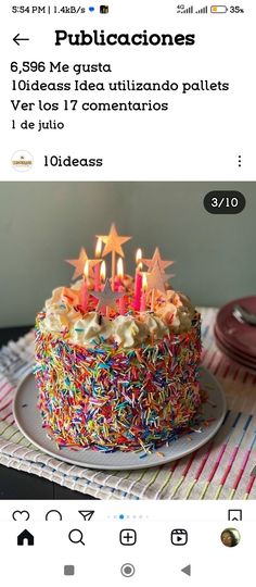 a birthday cake with lit candles on it and the caption in spanish below reads, publiccaciones