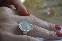 Sterling silver Queen Elizabeth coin ring, with a matte or oxidized finish This signet ring is made of an old British 20p coin which was attached to a wide band to create a lovely vintage style coin signet ring. This silver coin ring is available both in 14 karat gold plating over brass or silver base (see last photo) and in solid sterling silver, polished to your taste: matte, shiny or slightly oxidized. Dimensions: The coin diameter is 2 cm (a bit over 0.75 inches) The coin ring ring is availa Vintage Coin Signet Ring As Gift, Vintage Coin Signet Ring For Gift, Vintage Coin Shaped Signet Ring Gift, Elegant Engraved Coin Rings, Hallmarked Coin Shaped Signet Ring As Gift, Signet Ring Women, Signet Ring Silver, Greek Mythology Jewelry, Gold Coin Ring