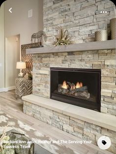 a living room with a fire place in it