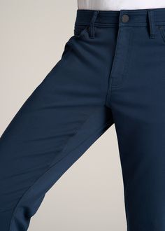 About Our Everyday Comfort 5-Pocket Pant for Tall Men Taking comfort to a new level. These 5-Pocket Pants for tall men are destined to be an everyday favorite. Made with a moisture-wicking fabric featuring antibacterial properties, they’ll keep you feeling fresh from the office to the outdoors. We didn’t just want to make another pair of slacks for tall men, we wanted to make the first pair you’ll grab on a day off, or pack for a weekend excursion. That’s why we’ve built these men’s tall pants w Classic Straight Bottoms With Patch Pockets, Straight Bottoms With Patch Pockets For Work, Straight Workwear Bottoms With Patch Pockets, Classic Jeans With 5-inch Inseam, Straight Leg Bottoms With Functional Pockets, Classic Jeans With Welt Pockets And 5-inch Inseam, Business Casual Work Pants With Pockets, Blue Business Casual Bottoms With Side Pockets, Workwear Jeans With Side Pockets And Standard Cut