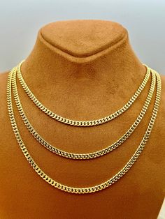 "14k Gold Curb Chain Necklace, 23.5\", 4.30 mm, 14.50 gr. 14k Gold Curb Chain Necklace, 22\", 4.30 mm, 13.42 gr. 14k Gold Curb Chain Necklace, 20\", 4.30 mm, 12.50 gr. 14k Gold Curb Chain Necklace, 18\", 4.30 mm, 11.25 gr. Priced to sell! Compare our prices to other similar sellers! Arrives in a GIFT BOX and includes FREE SHIPPING within the USA and Canada. International shipping is available at the most economical rates on ETSY. I HAVE BEEN IN THE JEWELRY BUSINESS ALL MY LIFE. I am a second -ge Cuban Link Curb Chain Necklace For Anniversary, Classic Cuban Link Necklace With Curb Chain For Anniversary, 14k Gold Cuban Link Necklace With Curb Chain, Gold Necklace For Men, Real Gold Chains, Mens Cross Necklace, Real Gold Jewelry, Gold Chains For Men, Cool Gifts For Women