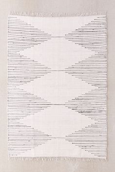 a white rug with black lines on it