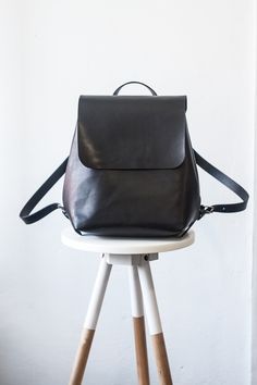 Small Leather Backpack Women / Custom black backpack, Minimalist backpack, Womens handbag, Mini backpack, Personalized gift, Travel backpack DESCRIPTION * one main compartment * interior pocket * back pocket * magnetic closure * adjustable shoulder straps * no lining * available in 7 colors MATERIAL Thick and durable cowhide leather DIMENSIONS Length: 8.6 inch (22 cm) Height: 11.4 inch (29 cm) Width: 4.3 inch (11 cm) Mini Black Backpack, Womens Rucksack, Small Leather Backpack, Stitch Backpack, Monogram Backpack, Minimalist Backpack, Womens Handbag, Brown Leather Backpack, Leather Backpack Purse