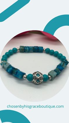 This is a beautiful beaded bracelet is made with a Tibetan silver focal bead with aqua rhinestones. There are Imperial Jasper cube beads, Aqua glass round beads and silver spacer beads. Tibetan silver focal bead is .5"Imperial Jasper cube beads are 6mm.Aqua glass round beads are 6mm. Silver spacer beads are 4mm. Thank you for visiting Chosen By His Grace Boutique! Czech Glass Stretch Bracelet With Spacer Beads, Elegant Turquoise Stretch Bracelet With Spacer Beads, Turquoise Faceted Beads Stretch Bracelet As Gift, Adjustable Turquoise Stretch Bracelet With Silver Beads, Adjustable Turquoise Crystal Bracelet With Silver Beads, Turquoise Stretch Bracelet With Silver Beads, Turquoise Beaded Bracelets With Silver Beads For Gift, Turquoise Beaded Bracelets With Silver Beads, Turquoise Faceted Beads Rondelle Bracelets