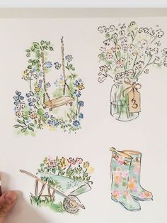 someone is drawing flowers and gardening related items