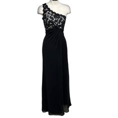 a black evening gown on a mannequin