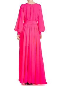 This 70's inspired maxi dress features a sexy cross-front V shape surplice neckline. The elasticized waist adjusts to fit a range of sizes and has an attached self-tying belt at the right-hand side seam. The bell sleeves add a hint of retro glamour and have a 3 button wide cuff.The opaque fabric is colored in the most striking rich and bright neon pink hue. The full, sweeping circle maxi skirt is perfect for making a dramatic entrance to any event. The skirt is partially lined.IMPORTANT SIZING I Circle Maxi Skirt, Retro Glamour, Kimono Sweater, Fashion District, Surplice Neckline, Flowy Maxi Dress, Medium Dress, Mid Length Skirts, 70s Inspired