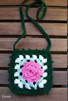 "Beautifully hand crafted purse design with colorful floral patten. 100% Acrylic with 100% Eco-fi lining (Polyester fiber made from 100% post-consumer recycle plastic bottles). Size: 6\" W x 6\" H Strap: 40\" *Hand-wash Recommended, All sizes are approximate." Green Flower-shaped Bag For Spring, Green Square Crochet Bag For Gift, Green Square Crochet Bag As Gift, Green Rectangular Crochet Bag, Green Floral Shoulder Bag For Everyday Use, Green Flower Shaped Shoulder Bag For Summer, Green Flower-shaped Shoulder Bag For Summer, Green Floral Shoulder Bag For Summer, Summer Flower-shaped Green Shoulder Bag