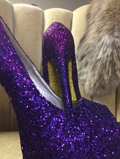 "These beautiful ombré heels are covered in a royal purple glitter starting at the toes and gradually transitions into a pink based purple glitter near the backs of the heels. This glitter is a chunky/ ultra fine mix that creates an exceptional sparkle and insures that every teeny tiny MM is covered by glitter. All of our heels are sealed with a water resistant sealant that also helps to protect the artwork. This heel is available in additional colors and shoe styles and is shown in a tall 6\" h Glamorous Purple Heels For Wedding, Glamorous Purple High Heels, Glamorous Purple Party Heels, Purple Glitter High Heels, Ombre Purple, Glitter High Heels, Womens Pumps, Spokane Wa, Purple Glitter