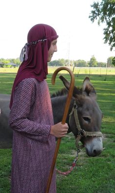 This costume represents Saint Joseph  as depicted in nativity scenes and includes: ~ burgundy/gray flannel long tunic that slips over the head  ~ cord tie cincture belt ~ burgundy desert type head covering with stretch headband This already made and ready to ship. Donkey and staff not included. Shepherd Costume, Joseph Costume, Nativity Scenes, Cord Ties, Stretch Headband, Grey Flannel, Boy Costumes, St Joseph, Long Tunic