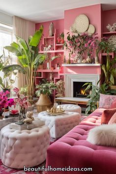 a living room filled with lots of pink furniture and flowers in vases on the wall