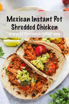 mexican instant pot shredded chicken on a tortilla with guacamole and tomatoes