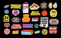 various stickers on a black background with words and phrases in different colors, shapes and sizes