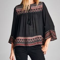 Play Up Your Layered Looks With The Help Of This Peasant Top. Bell Sleeves And An Artful Pattern Complete The Look. 100% Rayon Hand Wash; Hang Dry Trades Bundle And Save Black Boho Print Tops For Spring, Black Peasant Top For Festival, Spring Black Boho Print Tops, Black Peasant Top With Floral Embroidery, Black Embroidered Peasant Top, Black Peasant Blouse With Floral Embroidery, Black Bohemian Tops With Boho Print, Black Bohemian Top With Boho Print, Black Peasant Top With Floral Embroidery For Festivals