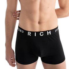 Inspired in London, and Made In Italy, John Richmond is known for his attention to quality and fit. His underwear is not only comfortable, but also makes a statement. These Low Waisted Trunks are created in a soft combed cotton. The elastic waistband has the John Richmond Logo embroidered with Silver Thread. The front is lined to ensure a great look. John Richmond Trunks have a 3" inseam for a perfect fit. 94% Cotton, 6% Spandex Richmond London, Athletic Clothing, John Richmond, Clothing Essentials, Athletic Outfits, Low Waisted, Pant Shirt, Boxer Briefs, Black Media