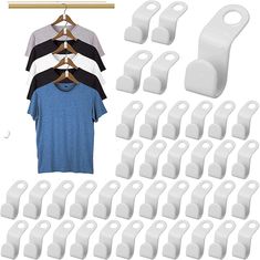 clothes hangers and t - shirts are shown in this image