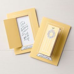 two greeting cards with the same design on them, one in yellow and one in white