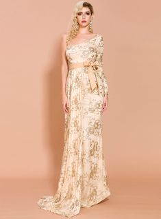 You are in search of a statement-making piece, look no further than this gold sequin party dress with all-over sparkle from kemedress. Layer of richly sequin creates the most ornate bodice, which radiates shimmer and sparkle. Long, sequin sleeve extends from the bodice, finishing in a sequin cuff adding a classic element to this glamorous style. The sequin from the bodice extends slightly onto the tulle skirt before extending into a full sheath silhouette, complete with embellished floral sequin. The romantic back of this one shoulder dress zips up and is complemented with a sparkling train. You can wear this dress as a formal look! Sequin Prom Dresses Mermaid, Long Sleeve Evening Dress, Sequins Prom Dress, Prom Dress Mermaid, Floor Length Prom Dresses, Dress Mermaid, Affordable Prom Dresses, Sequin Prom Dress, Long Sleeve Evening Dresses