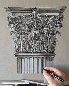 a drawing of a column with flowers on it