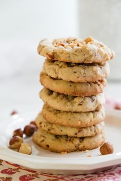 a stack of cookies sitting on top of a white plate