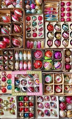 many different types of ornaments are in boxes