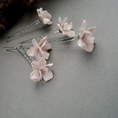 Elegant and romantic blush hairpiece with flower. Invite florals to your wardrobe with this art hair accessories!  Hair pins with dusty pink flowers is perfect for formal event. Ideal for a wedding! Also great for Bridesmaids. Pick the necklace, earrings and headpieces for bride, bridesmaids and flower girls in the same theme in my store. Each flowers is handcrafted. Made by me completely by hand from polymer clay.  No mold Used! The Flowers of polymer clay are waterproof. Color may vary from monitor to monitor or camera lighting. If you have any questions regarding this product please do not hesitate to get in touch. I can make hairpins like this with any color - leave me message in order. Free shipping! Ready to ship! Browse around my entire shop here https://www.etsy.com/shop/morecolors Dusty Rose Hair, Blush Hair, Bridal Hair Accessories Flower, Bridal Floral Headpiece, Bride Headpiece, Wedding Headband, Clay Flowers, Flower Hair Accessories, Boho Bridal