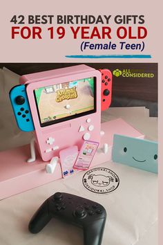 a pink nintendo wii game console next to two blue and red controllers with the text, 42 best birthday gifts for 19 year old female teen