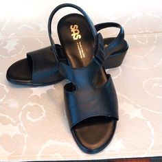 Sas Suntimer- Heeled Leather Sandals Nwot Premium Leather Adjustable Velcro Strap Slingback Sas Tripad Comfort Insoles Black Size 10.5 M Heel 1.625" Nwot Comfort Sas Sandals Can Be Worn With Dresses, Pants, Or Shorts. A Comfortable Addition To Your Wardrobe!!! Black Synthetic Closed Toe Slingback Sandals, Formal Slingback Sandals With Round Toe And Leather Footbed, Black Slingback Sandals With Cushioned Footbed And Round Toe, Comfortable Black Wedge Sandals With Leather Footbed, Cushioned Medium Width Slingback Sandals With Round Toe, Black Closed Toe Slingback Sandals With Leather Footbed, Black Sandals With Leather Footbed And Low Heel, Black Low Heel Sandals With Leather Footbed, Medium Width Synthetic Closed Toe Slingback Sandals