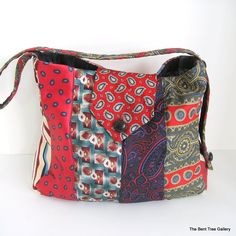 a multicolored purse with different patterns on it's front and side pockets