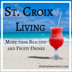 a red drink sitting on top of a sandy beach next to the ocean with text st croix living more than beaches and fruity drinks