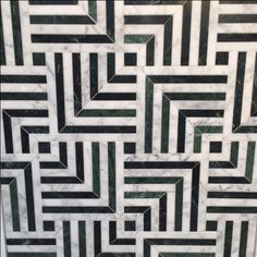 an abstract marble pattern with black and white stripes on it's sides, in the middle