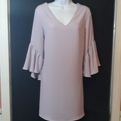 This Is Brand Nwts. Gorgeous Pale Lilac Color Dress. Has Nice V Neck Falls Straight, Does Have A Lining. Has 3/4 Sleeves That Absolutely Make This Dress Stunning Looking. There Straight 3/4 Then They Have This Beautiful Bell At The End. Very Stunning Looking On. The Color Is Beautiful Too!. This Is A Dress That You Could Belt Or Just Put On Some Pretty Sandals And Your Looking Great For Any Occasion . Measurements Are Approximately Lying Flat Pit To Pit 18-19" Length 34" Nwts Elegant Midi Length Nordstrom Dress, Elegant Midi-length Nordstrom Dress, Spring V-neck Dresses By Nordstrom, Nordstrom V-neck Spring Dresses, Nordstrom Spring Midi Dresses, Nordstrom Knee-length Spring Dress, Nordstrom Spring Dresses, Lilac Color Dress, Lace Bodycon Midi Dress