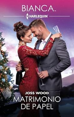 a man and woman hugging each other in front of a christmas tree with the caption's name on it